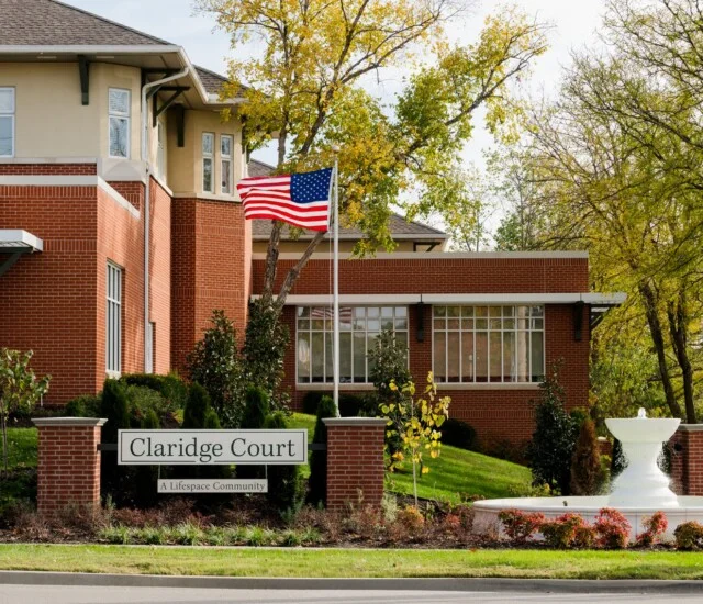 Claridge Court entrance sign and building exterior in Prairie Village, Kansas