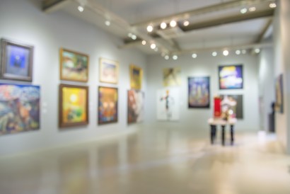 art gallery featuring many hanging portraits in kansas city