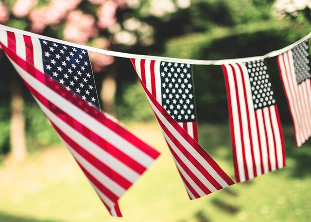 close up of string with American flags, decoration for the Veteran's Day