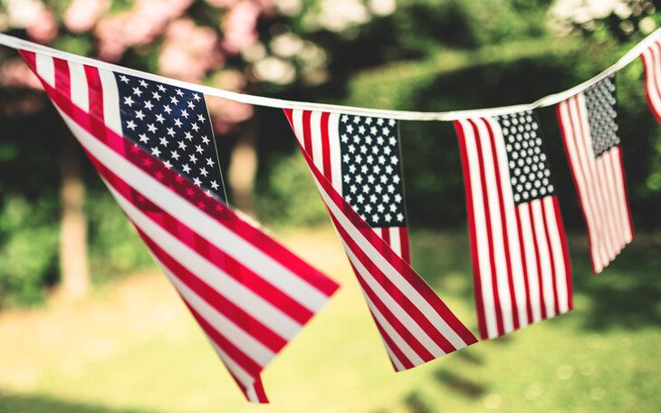 close up of string with American flags, decoration for the Veteran's Day