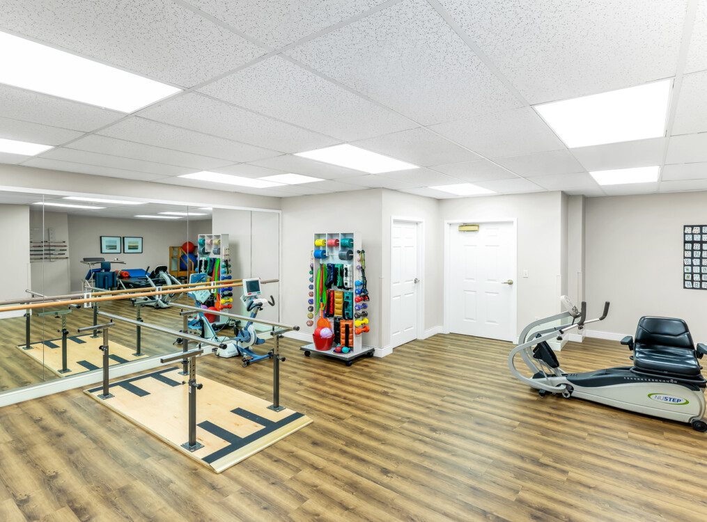 Rehabilitation and physical therapy gym at Claridge Court Senior Living Community