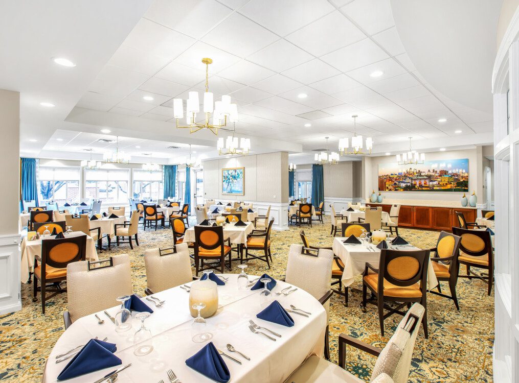 Spacious formal dining room area at Claridge Court Senior Living Community