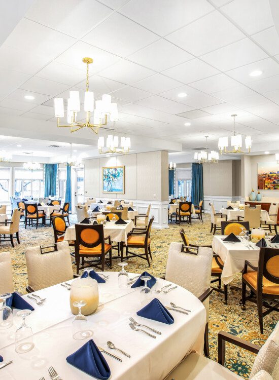 Spacious formal dining room area at Claridge Court Senior Living Community