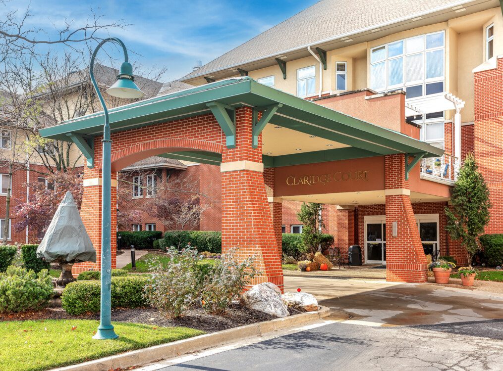 Entrance and driveway for Claridge Court Senior Living Community