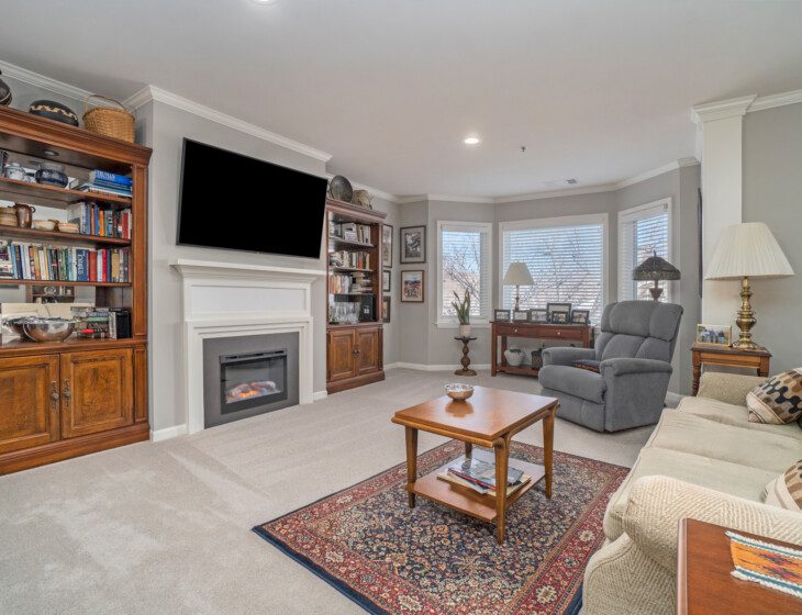 spacious living room area of senior apartment at Claridge Court Senior Living Community